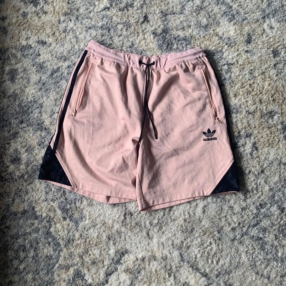 Used pink and black adidas men’s shorts